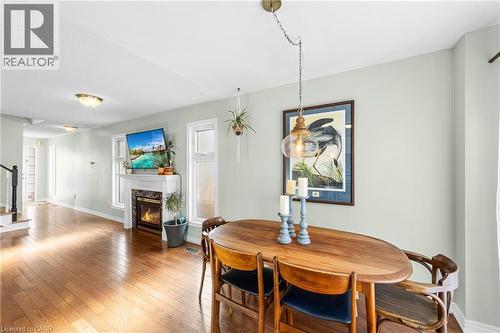 4401 Vallence Drive, Burlington, ON - Indoor Photo Showing Dining Room With Fireplace