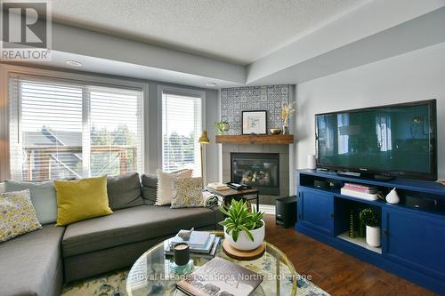 30 Joseph Trail, Collingwood, ON - Indoor Photo Showing Living Room With Fireplace