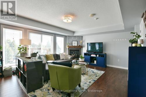 30 Joseph Trail, Collingwood, ON - Indoor Photo Showing Living Room With Fireplace