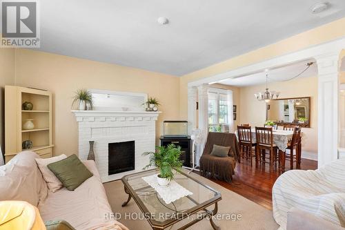 unit 5 living - 55 Balsam Avenue S, Hamilton, ON - Indoor Photo Showing Living Room With Fireplace