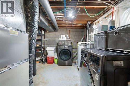 111 Macleod Trail E, Rural Foothills County, AB - Indoor Photo Showing Laundry Room
