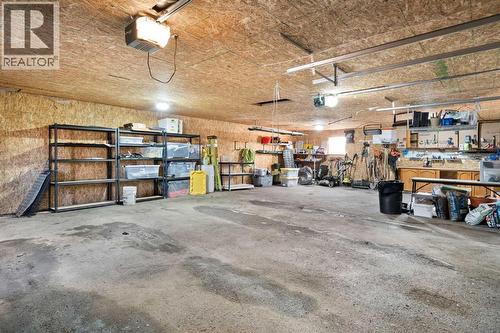 MASSIVE DOUBLE GARAGE - 111 Macleod Trail E, Rural Foothills County, AB - Indoor Photo Showing Garage