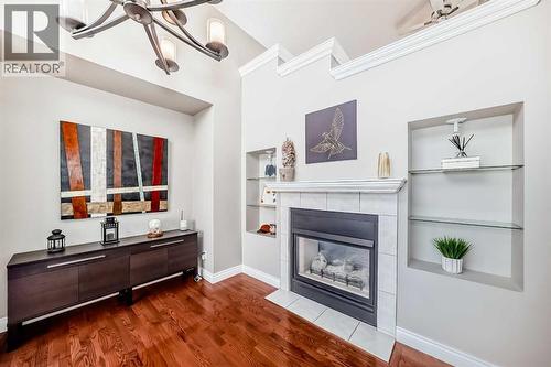 188 Hidden Ranch Crescent Nw, Calgary, AB - Indoor With Fireplace