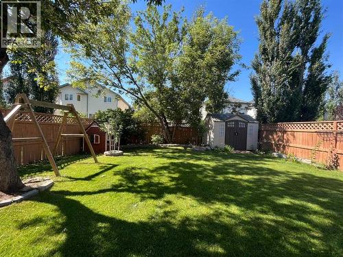 Mature Trees with enhanced privacy - 188 Hidden Ranch Crescent Nw, Calgary, AB - Outdoor With Backyard