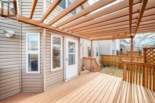 Professionally painted deck 2026 - 188 Hidden Ranch Crescent Nw, Calgary, AB - Outdoor With Deck Patio Veranda With Exterior