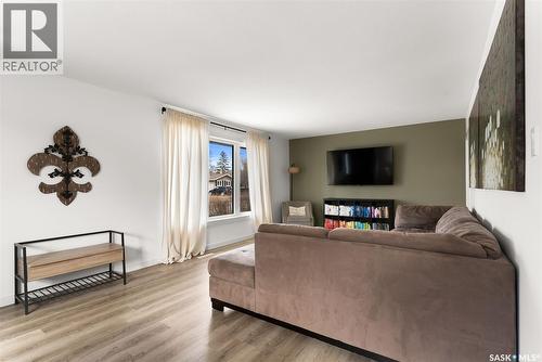 73 Coldwell Road, Regina, SK - Indoor Photo Showing Living Room With Fireplace