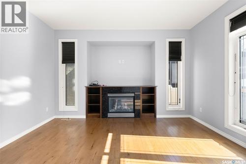 6925 Maple Ridge Drive, Regina, SK - Indoor Photo Showing Living Room With Fireplace