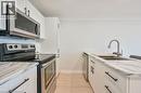 738 Mohawk Road E Unit# Upper Unit, Hamilton, ON  - Indoor Photo Showing Kitchen With Stainless Steel Kitchen With Double Sink 