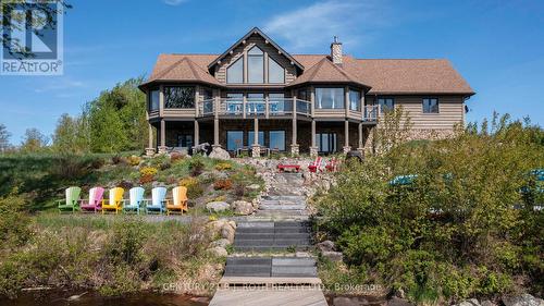 64 Mccords Road, Mckellar, ON - Outdoor With Deck Patio Veranda With Facade