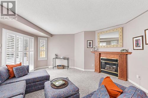 57 Barker Boulevard, Collingwood, ON - Indoor Photo Showing Living Room With Fireplace