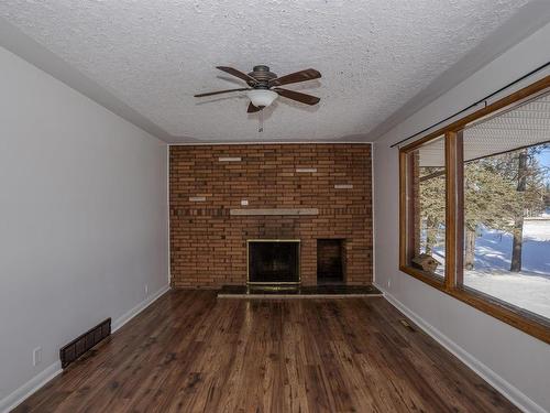 2995 Oliver Road, Thunder Bay, ON - Indoor Photo Showing Living Room With Fireplace