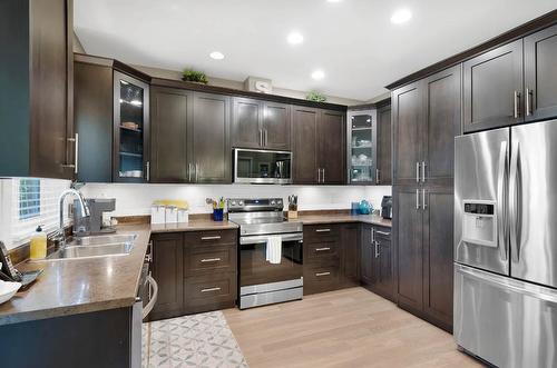 123-2920 Valleyview Drive, Kamloops, BC - Indoor Photo Showing Kitchen With Stainless Steel Kitchen With Double Sink With Upgraded Kitchen