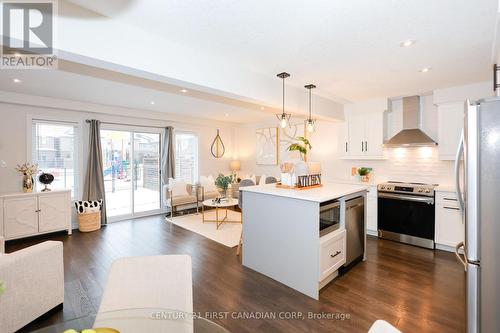 Kitchen with quartz island. - 9 - 2040 Shore Road, London South (South A), ON - Indoor Photo Showing Other Room
