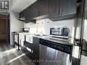 F504 - 275 Larch Street, Waterloo, ON  - Indoor Photo Showing Kitchen With Double Sink With Upgraded Kitchen 