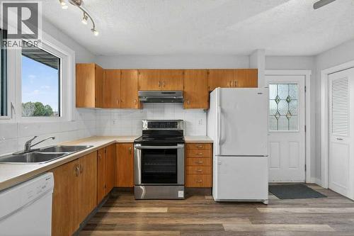 4 Abergale Way Ne, Calgary, AB - Indoor Photo Showing Kitchen With Double Sink