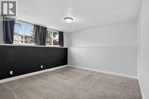 4 Abergale Way Ne, Calgary, AB - Indoor Photo Showing Other Room