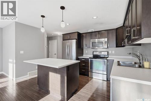 7 365 Dawson Crescent, Saskatoon, SK - Indoor Photo Showing Kitchen With Double Sink With Upgraded Kitchen