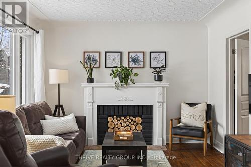 34 Devonshire Avenue, London South (South G), ON - Indoor Photo Showing Living Room With Fireplace