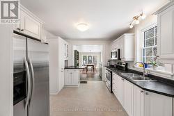 Fresh white kitchen with bonus room - 