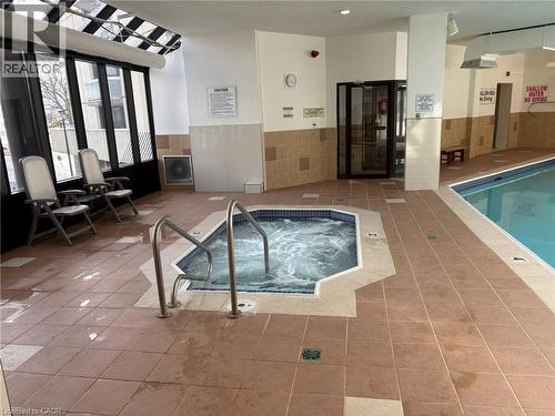 363 Colborne Street Unit# 404, London, ON - Indoor Photo Showing Other Room With In Ground Pool