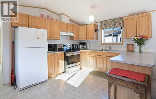 4 Meadowplace Green E, Brooks, AB 