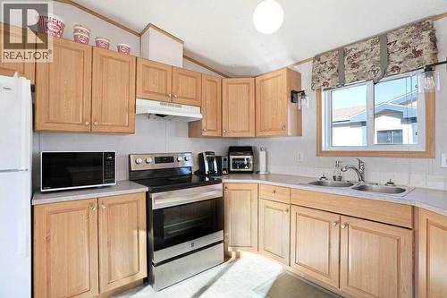 4 Meadowplace Green E, Brooks, AB 