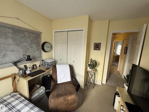 #208 178 Bridgeport Bv, Leduc, AB - Indoor With Fireplace