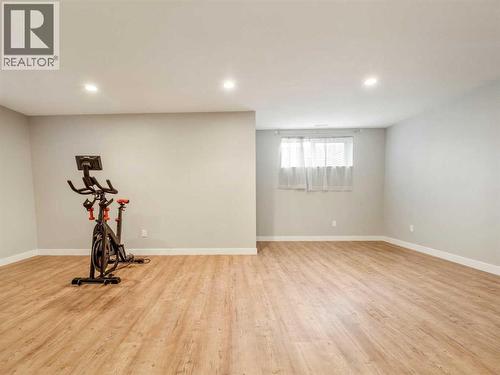 166 Crocus Terrace W, Lethbridge, AB - Indoor Photo Showing Gym Room