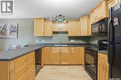 453 Brooklyn Crescent, Warman, SK - Indoor Photo Showing Kitchen With Double Sink