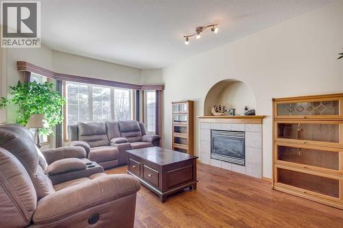 38 Kendrew Drive, Red Deer, AB - Indoor Photo Showing Living Room With Fireplace