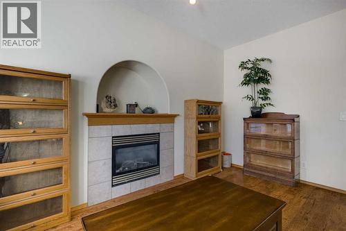 38 Kendrew Drive, Red Deer, AB - Indoor Photo Showing Living Room With Fireplace