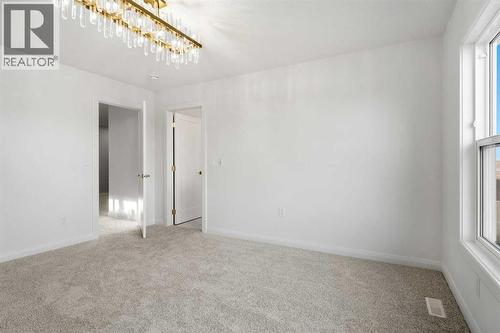 94 Cornerbrook Crescent Ne, Calgary, AB - Indoor Photo Showing Other Room