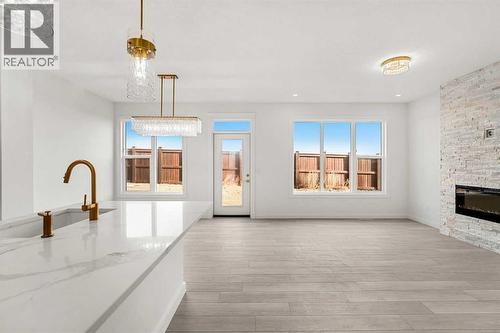 94 Cornerbrook Crescent Ne, Calgary, AB - Indoor With Fireplace
