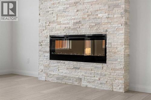 94 Cornerbrook Crescent Ne, Calgary, AB - Indoor With Fireplace