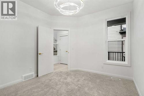 94 Cornerbrook Crescent Ne, Calgary, AB - Indoor Photo Showing Other Room