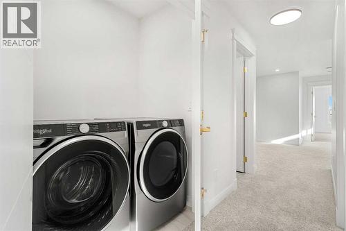 94 Cornerbrook Crescent Ne, Calgary, AB - Indoor Photo Showing Laundry Room