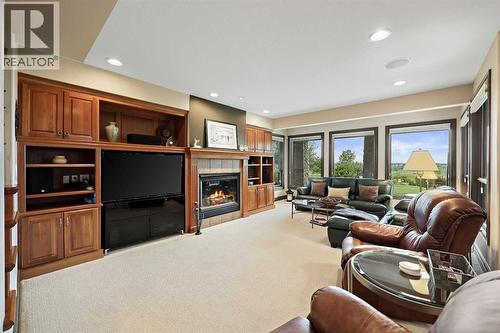 149 Mt Douglas Circle Se, Calgary, AB - Indoor Photo Showing Living Room With Fireplace