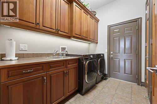 149 Mt Douglas Circle Se, Calgary, AB - Indoor Photo Showing Laundry Room