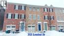 3-storey attached garage - 352 Louisa Street, Kitchener, ON  - Outdoor With Facade 