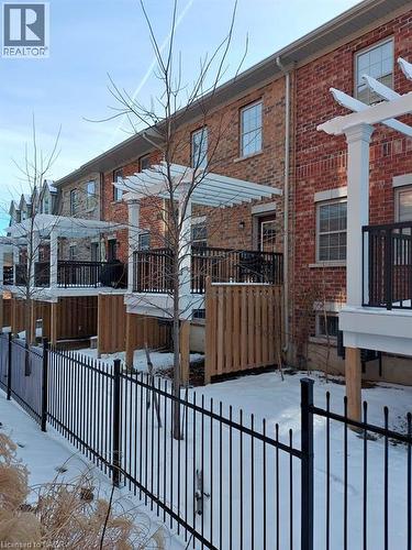 backyard with patio from kitchen (old photo) - 352 Louisa Street, Kitchener, ON - Outdoor With Deck Patio Veranda