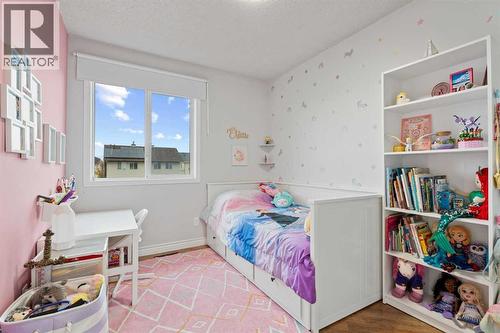 242 Elgin Place Se, Calgary, AB - Indoor Photo Showing Bedroom