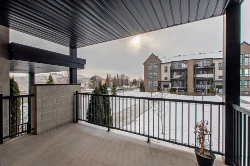 Terrasse - 201-691 Mtée Des Pionniers, Terrebonne (Lachenaie), QC - Outdoor With Exterior