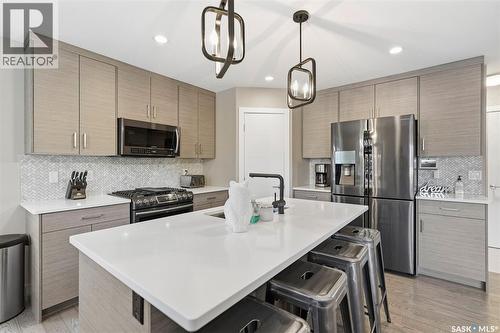 222 Newton Link, Saskatoon, SK - Indoor Photo Showing Kitchen With Upgraded Kitchen