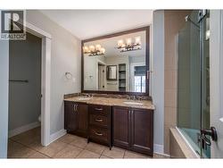 Primary ensuite with double sinks and glass shower w/soaker tub - 