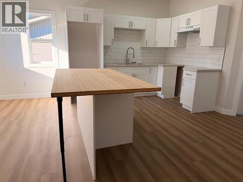 4834 62 Avenue, Taber, AB - Indoor Photo Showing Kitchen