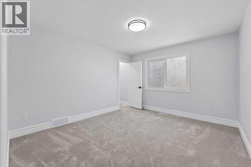 98 Waterford Crescent, Chestermere, AB - Indoor Photo Showing Other Room