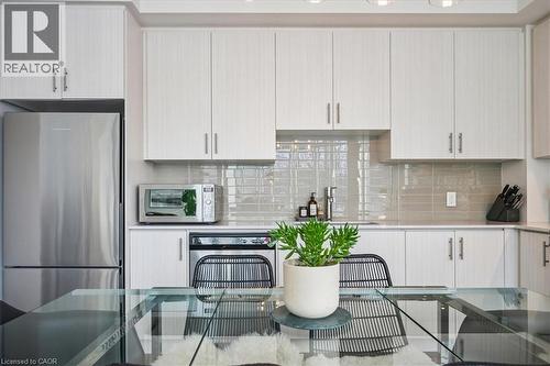 320 Plains Road E Unit# 211, Burlington, ON - Indoor Photo Showing Kitchen With Upgraded Kitchen