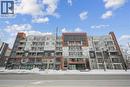 320 Plains Road E Unit# 211, Burlington, ON  - Outdoor With Balcony With Facade 