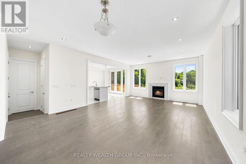 261 Seaview Heights, East Gwillimbury, ON - Indoor Photo Showing Other Room With Fireplace