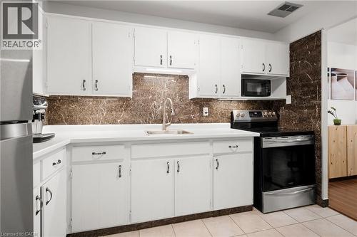 279 Chandler Drive Unit# 203, Kitchener, ON - Indoor Photo Showing Kitchen